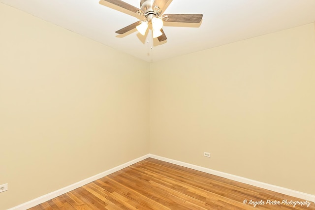 unfurnished room featuring baseboards, a ceiling fan, and light wood-type flooring