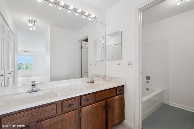 1250 Rudolph Rd Unit 5B, Northbrook, IL 60062 - full bathroom featuring double vanity, tile patterned floors, and baseboards