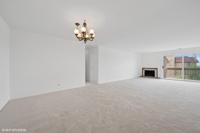 1250 Rudolph Rd Unit 5B, Northbrook, IL 60062 - unfurnished living room with a chandelier, carpet flooring, and a fireplace with raised hearth