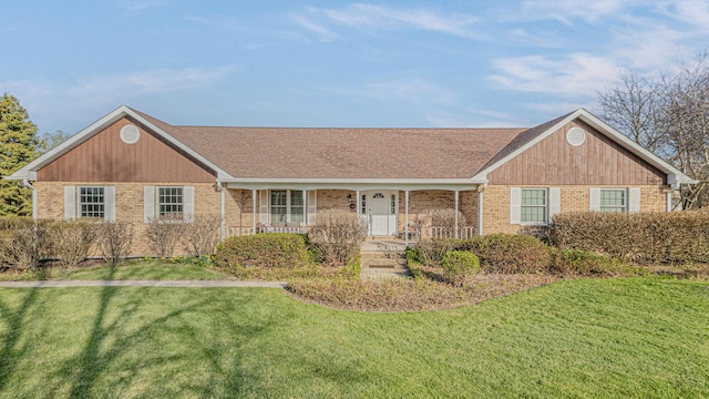 39935 N Prairie View Dr, Wadsworth, IL 60083 - single story home with brick siding, a front yard, and a porch