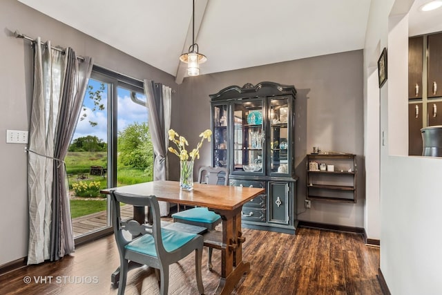 62 Foxhurst Ln, Newark, IL 60541 - dining room with dark wood-style flooring and lofted ceiling