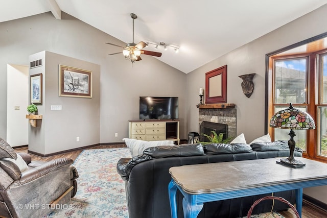 62 Foxhurst Ln, Newark, IL 60541 - living area with a ceiling fan, a fireplace, and wood finished floors