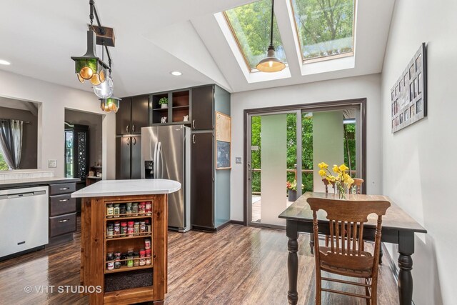 62 Foxhurst Ln, Newark, IL 60541 - kitchen featuring open shelves, appliances with stainless steel finishes, dark wood-style floors, light countertops, and a skylight