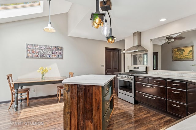 62 Foxhurst Ln, Newark, IL 60541 - kitchen featuring stainless steel range with gas cooktop, wall chimney range hood, dark wood-type flooring, dark brown cabinetry, and recessed lighting