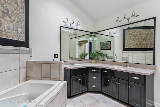 62 Foxhurst Ln, Newark, IL 60541 - full bath featuring tile patterned flooring, double vanity, a bath, and lofted ceiling