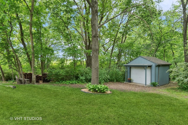 62 Foxhurst Ln, Newark, IL 60541 - view of green lawn with an outbuilding and a garage