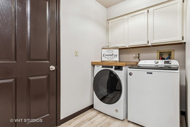 62 Foxhurst Ln, Newark, IL 60541 - laundry room featuring cabinet space, independent washer and dryer, and light wood-style floors