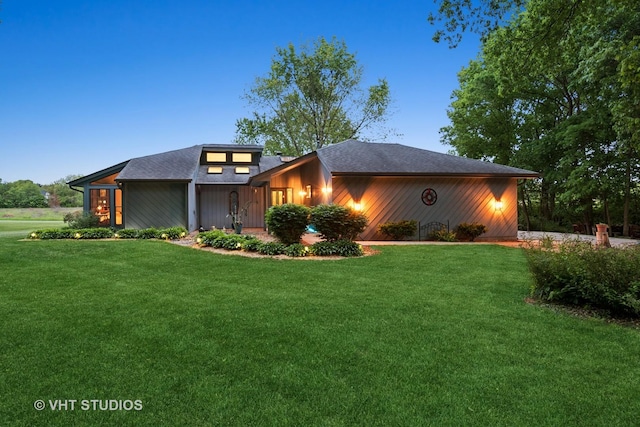 62 Foxhurst Ln, Newark, IL 60541 - view of front of house featuring a front yard and roof with shingles