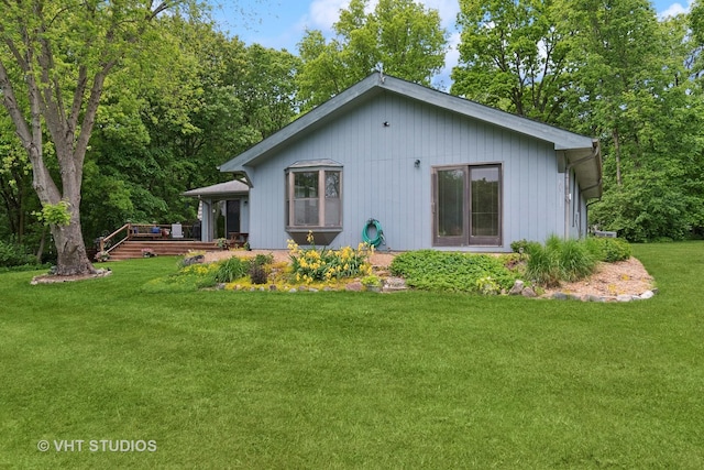 62 Foxhurst Ln, Newark, IL 60541 - rear view of house featuring a lawn