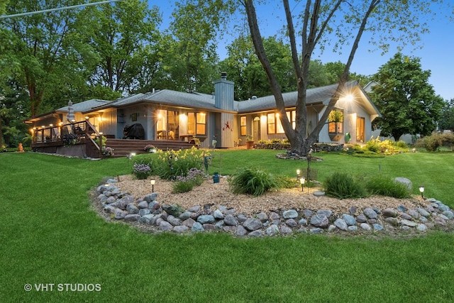 62 Foxhurst Ln, Newark, IL 60541 - rear view of house with a chimney and a lawn