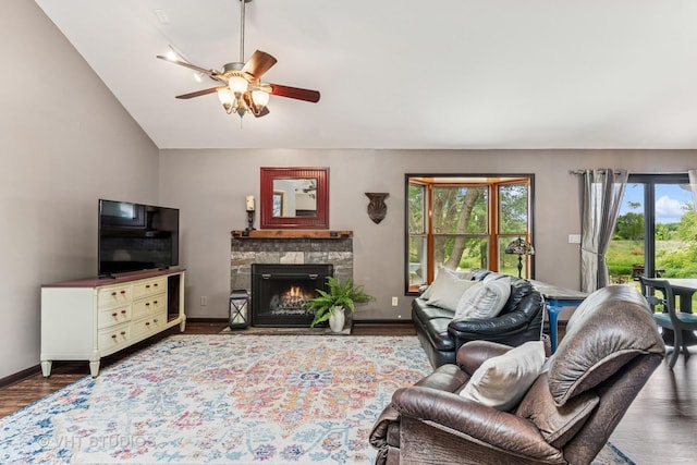 62 Foxhurst Ln, Newark, IL 60541 - living area with ceiling fan, lofted ceiling, wood finished floors, and a stone fireplace