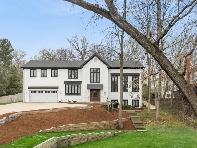 16 W Birchwood Ave, Hinsdale, IL 60521 - modern farmhouse style home with an attached garage, concrete driveway, and stucco siding