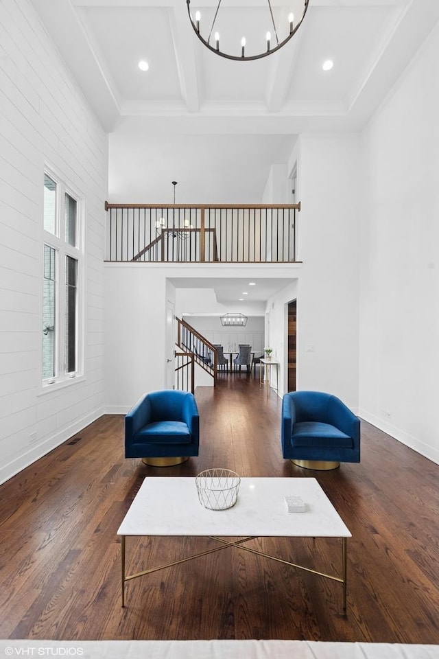 16 W Birchwood Ave, Hinsdale, IL 60521 - sitting room featuring a chandelier, coffered ceiling, baseboards, stairs, and wood finished floors