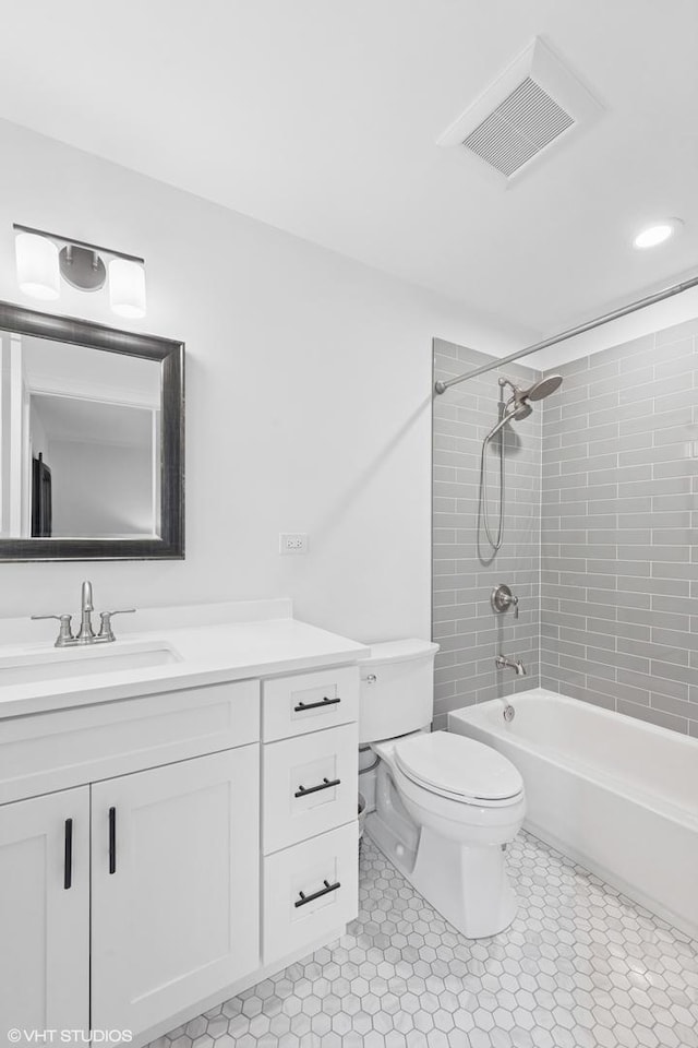 16 W Birchwood Ave, Hinsdale, IL 60521 - full bathroom featuring vanity, toilet, shower / bathtub combination, and tile patterned floors