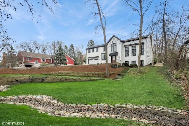 16 W Birchwood Ave, Hinsdale, IL 60521 - view of front of home featuring a front yard and an attached garage