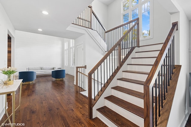 16 W Birchwood Ave, Hinsdale, IL 60521 - stairs featuring wood finished floors, recessed lighting, a towering ceiling, and baseboards