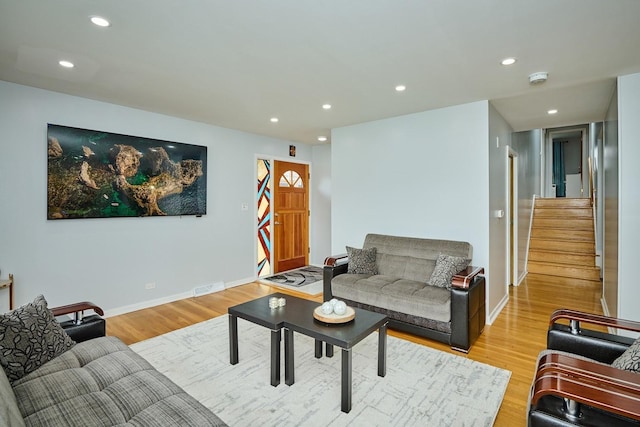 8856 N Merrill St, Niles, IL 60714 - living room with stairway, visible vents, baseboards, light wood-type flooring, and recessed lighting
