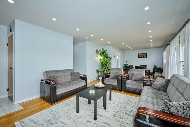 8856 N Merrill St, Niles, IL 60714 - living area featuring baseboards, recessed lighting, visible vents, and light wood finished floors