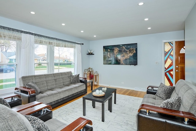 8856 N Merrill St, Niles, IL 60714 - living area with recessed lighting, wood finished floors, and baseboards