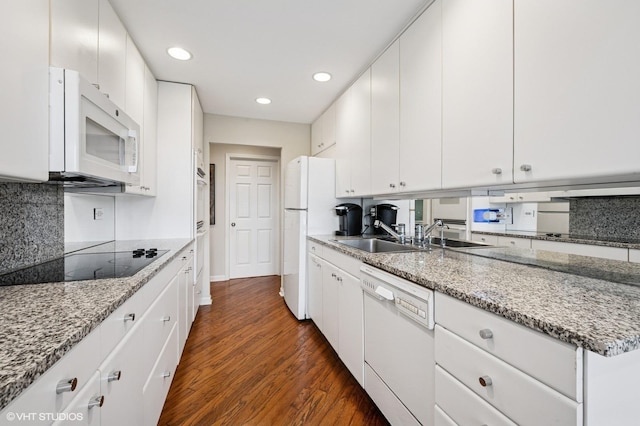 1220 Rudolph Rd Unit 5F, Northbrook, IL 60062 - kitchen featuring white appliances, a sink, dark wood-type flooring, decorative backsplash, and recessed lighting