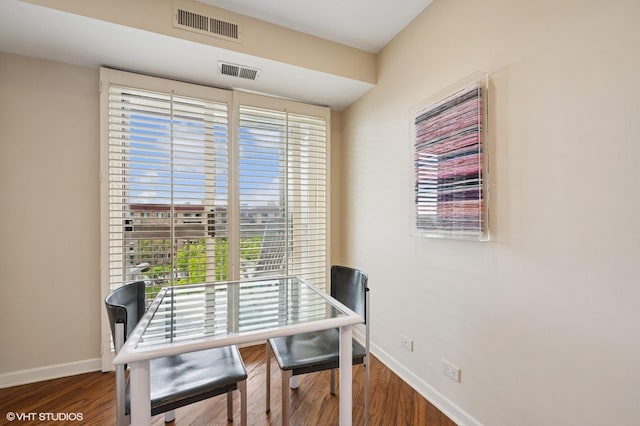 1220 Rudolph Rd Unit 5F, Northbrook, IL 60062 - dining area featuring baseboards, wood finished floors, and an office area