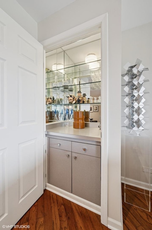 1220 Rudolph Rd Unit 5F, Northbrook, IL 60062 - indoor dry bar with dark wood-type flooring and baseboards