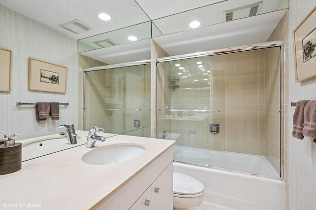 1220 Rudolph Rd Unit 5F, Northbrook, IL 60062 - full bathroom with vanity, toilet, enclosed tub / shower combo, recessed lighting, and wallpapered walls