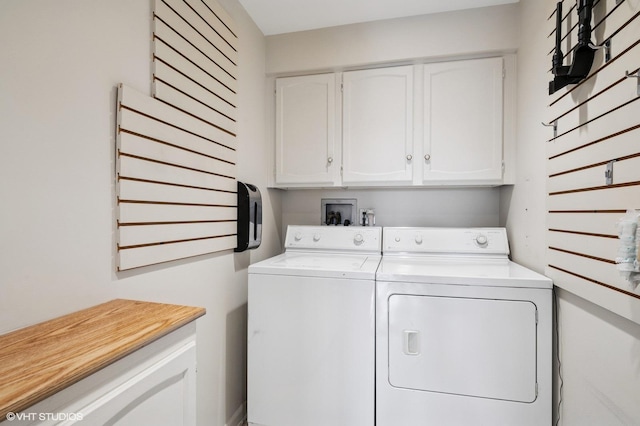1220 Rudolph Rd Unit 5F, Northbrook, IL 60062 - washroom with cabinet space and separate washer and dryer