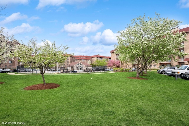 1220 Rudolph Rd Unit 5F, Northbrook, IL 60062 - view of community with a residential view and a lawn