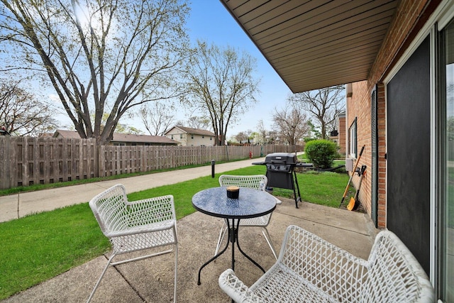 view of patio / terrace featuring area for grilling and a fenced backyard