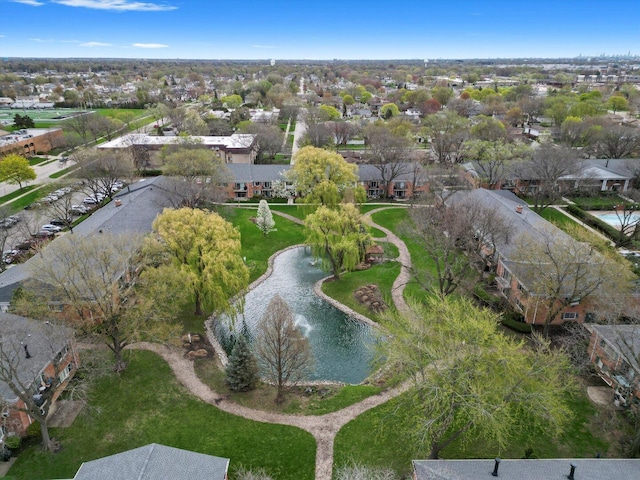 bird's eye view with a residential view and a water view