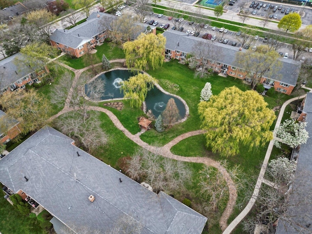 drone / aerial view with a water view