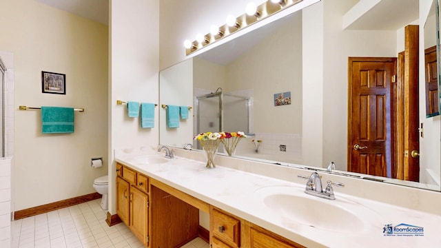 bathroom with a shower stall, toilet, tile patterned flooring, double vanity, and a bathtub