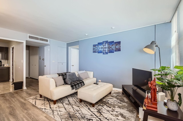 6301 N Sheridan Rd Unit 10F, Chicago, IL 60660 - living room with wood finished floors and visible vents