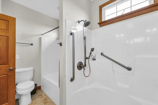 full bath featuring toilet, tile patterned flooring, and baseboards