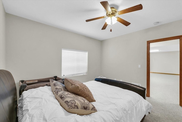 bedroom featuring carpet flooring and a ceiling fan