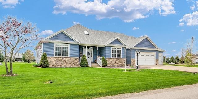view of front of home featuring an attached garage, driveway, stone siding, and a front lawn