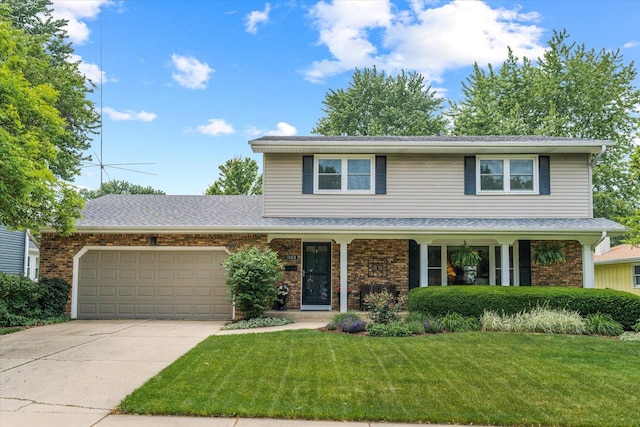 1088 Alameda Dr, Aurora, IL 60506 - traditional-style house featuring a garage, brick siding, a front lawn, driveway, and a porch