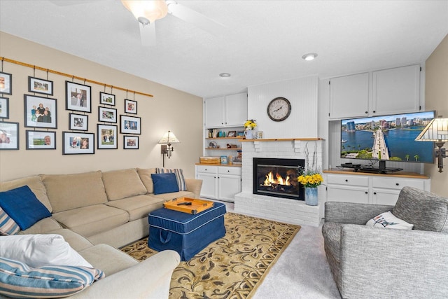 1088 Alameda Dr, Aurora, IL 60506 - living area with carpet flooring, a fireplace, and ceiling fan