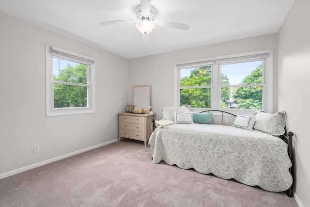 1088 Alameda Dr, Aurora, IL 60506 - carpeted bedroom with baseboards and a ceiling fan