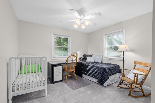 1088 Alameda Dr, Aurora, IL 60506 - carpeted bedroom featuring multiple windows and ceiling fan