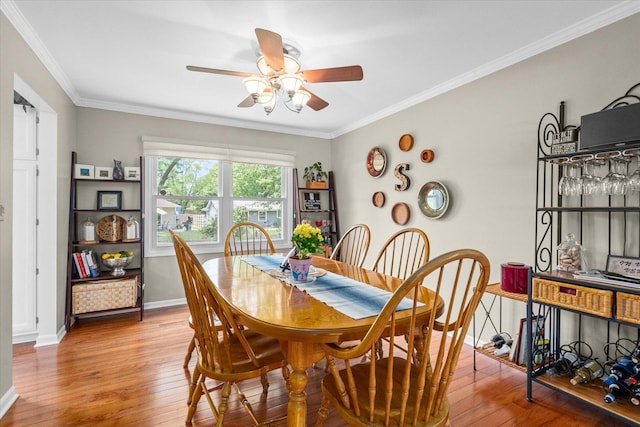 1088 Alameda Dr, Aurora, IL 60506 - dining room with a ceiling fan, hardwood / wood-style floors, and ornamental molding