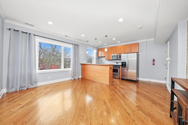 kitchen featuring stainless steel appliances, baseboards, a peninsula, light countertops, and ornamental molding