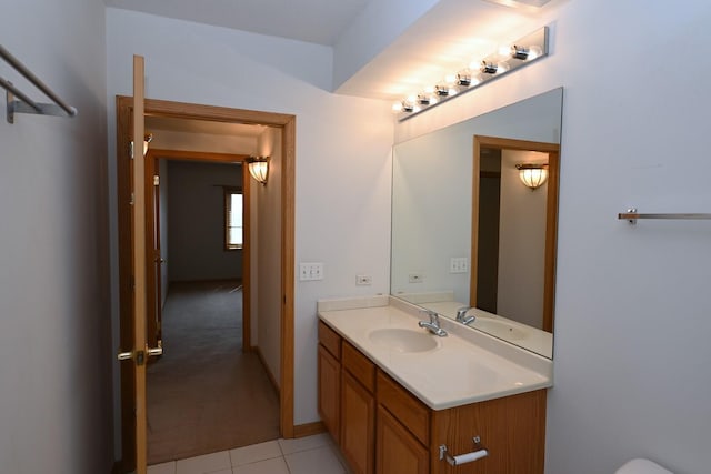 bathroom with vanity and tile patterned flooring