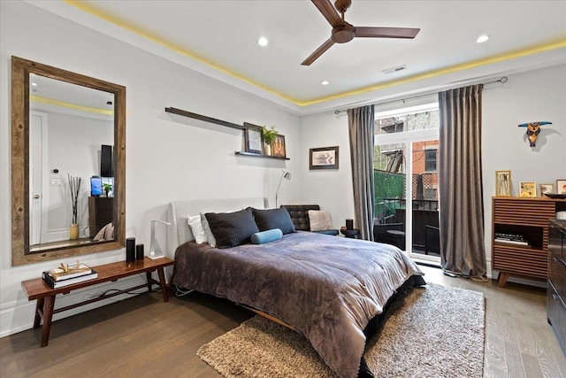 bedroom with access to exterior, recessed lighting, a ceiling fan, wood finished floors, and visible vents