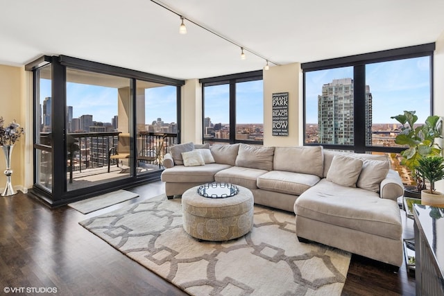 1122 N Clark St Unit 3501, Chicago, IL 60610 - living room featuring a view of city, floor to ceiling windows, rail lighting, and wood finished floors