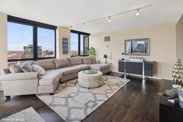 1122 N Clark St Unit 3501, Chicago, IL 60610 - living area featuring track lighting, wood finished floors, and visible vents