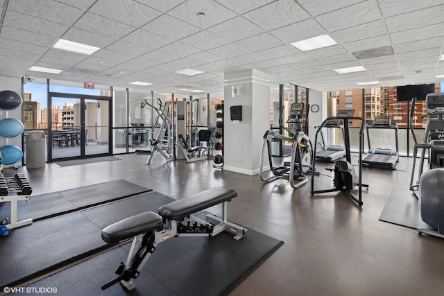 1122 N Clark St Unit 3501, Chicago, IL 60610 - workout area with baseboards, floor to ceiling windows, and a drop ceiling