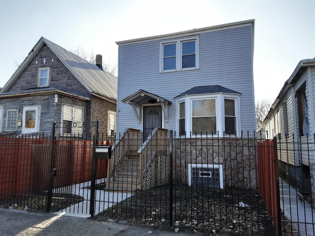 509 W 81st St, Chicago, IL 60620 - view of front facade featuring a fenced front yard and a gate