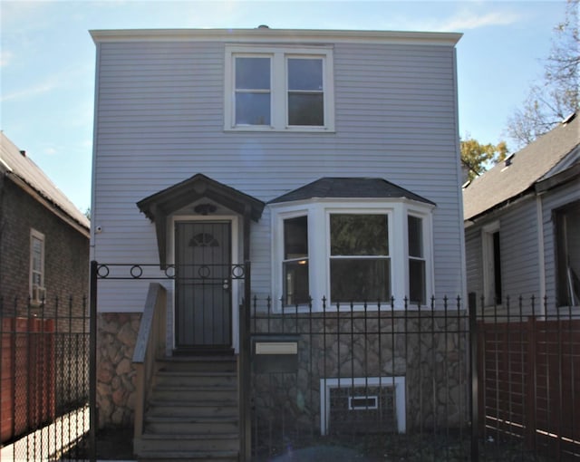509 W 81st St, Chicago, IL 60620 - view of front of house with fence and stone siding